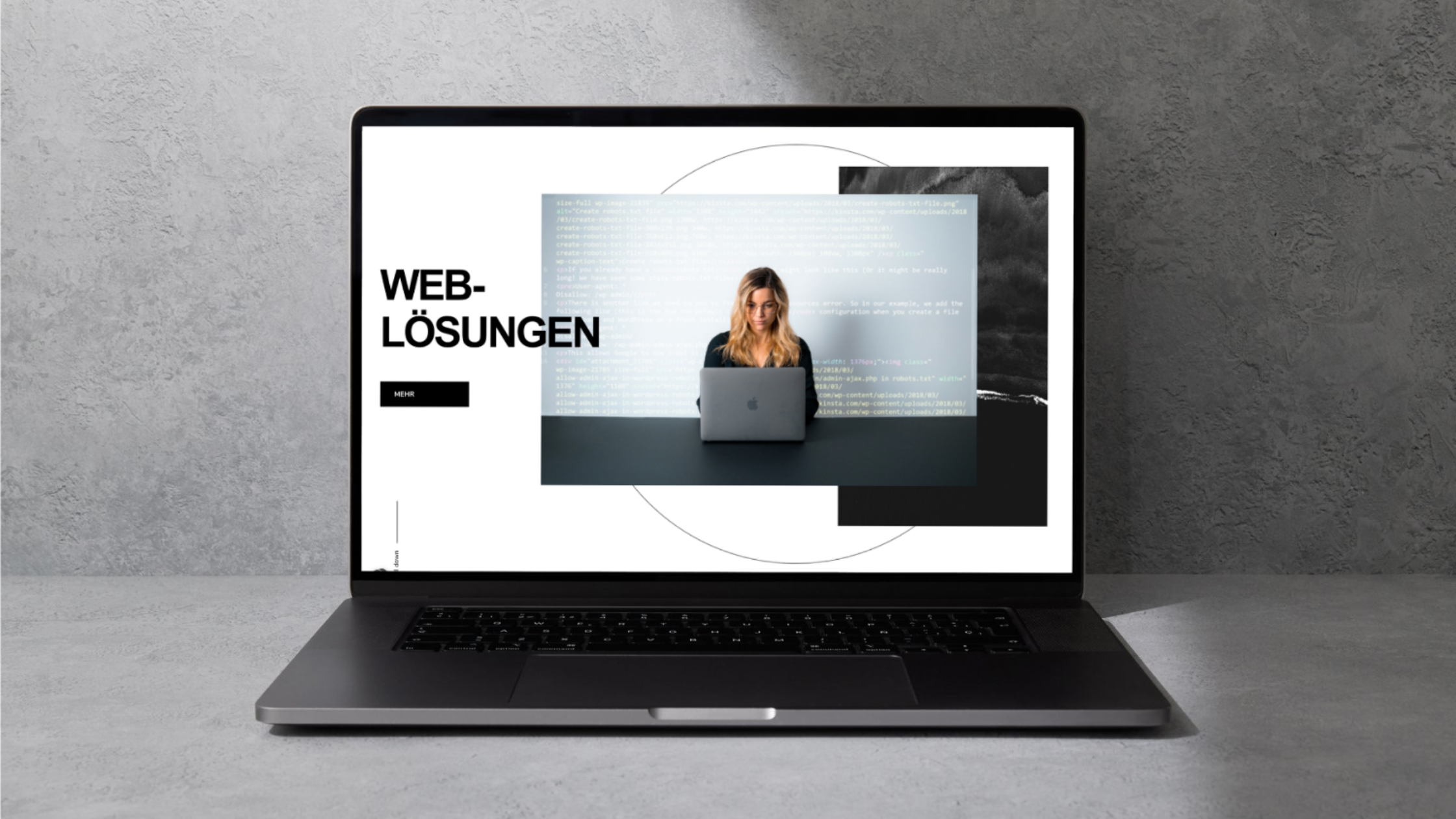 Notebook BIldschirm zeigt eine Seite mit dem Schriftzug Web-Lösungen